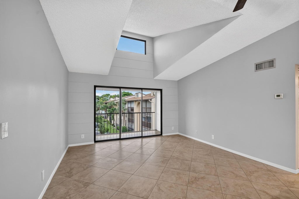 Photo of 812 SKY PINE Way #A3, Greenacres, FL 33415 (MLS # B26070583)