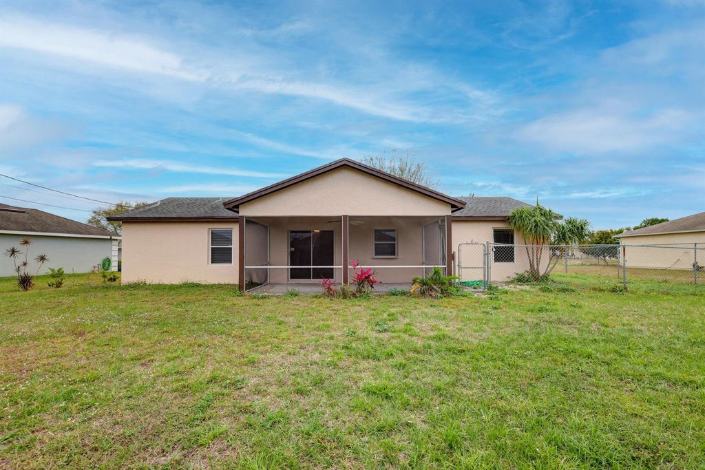 Photo of 4352 SW Elaine Court, Port Saint Lucie, FL 34953 (MLS # R10965644)