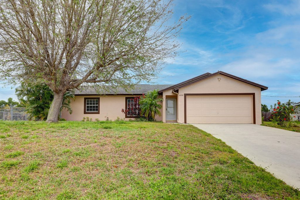 Photo of 4352 SW Elaine Court, Port Saint Lucie, FL 34953 (MLS # R10965644)