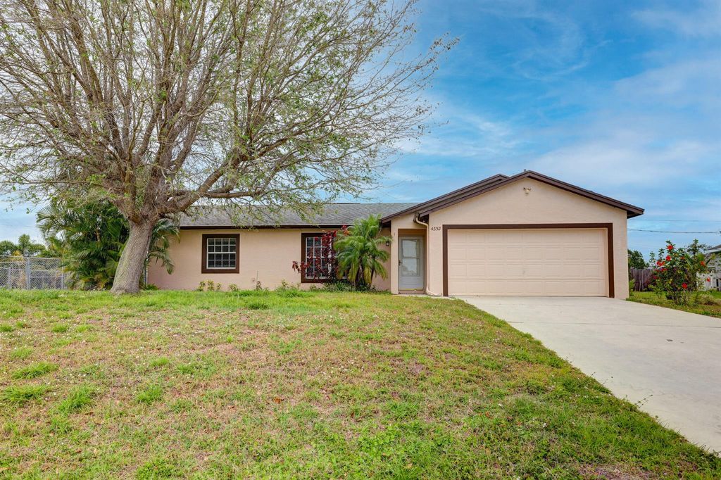 Photo of 4352 SW Elaine Court, Port Saint Lucie, FL 34953 (MLS # R10965644)