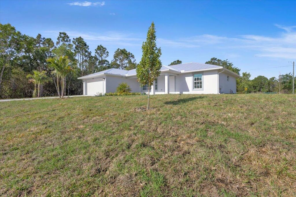 Photo of 3393 NW 38th Avenue, Okeechobee, FL 34972 (MLS # B26010570)