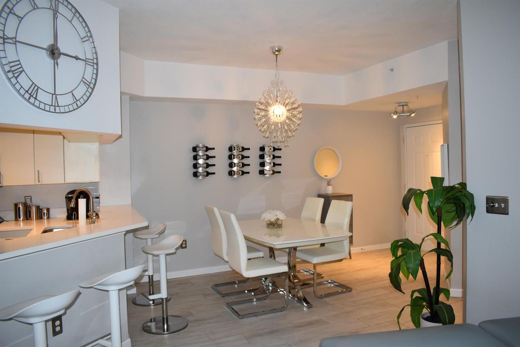 Photo of 3020 Alcazar Place #306, Palm Beach Gardens, FL 33410 (MLS # R11145704)