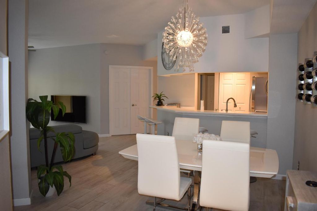 Photo of 3020 Alcazar Place #306, Palm Beach Gardens, FL 33410 (MLS # R11145704)