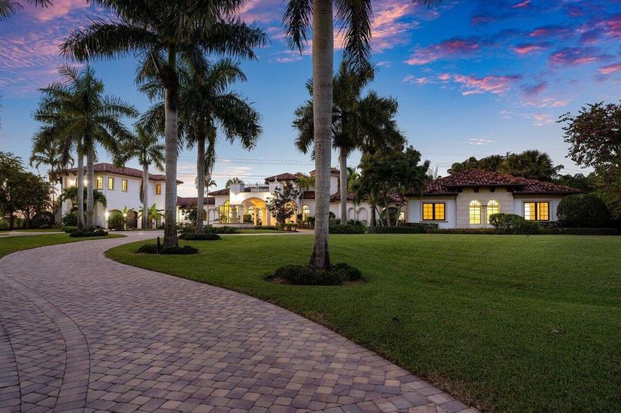 Set on nearly 5 acres of lakefront property, this custom built estate offers a truly private oasis in sought after Delray Beach within the gated enclave of Tierra Del Rey. This compound encompasses over 9,000 square feet and is meticulously crafted to the highest standards. This property features a sprawling main house and 3 separate guest quarters. Interior highlights include: stunning chef's kitchen, soaring ceilings, stunning architectural arches/moldings and home theater which doubles as a safe room.  Second to none, this extremely private and expansive backyard is an entertainers dream with a summer kitchen, beach entry custom pool with cascade waterfall and swim up bar with Tiki Hut. A truly epic property allowing for the best indoor/outdoor lifestyle that South Florida has to offer