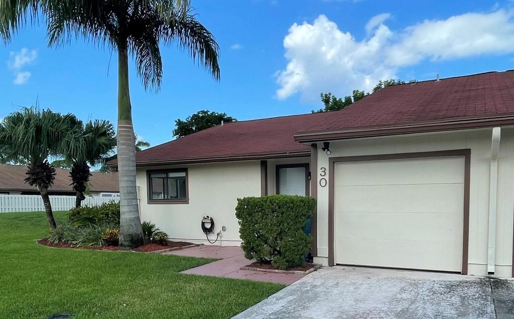 You won't want to miss this well maintained corner villa with 3 bedrooms and 2 baths plus an attached 1 car garage and a covered screened in patio plus a spacious paver patio that overlooks a expansive gassy area. This villa is located in desirable Boynton Lakes which features pool, tennis court, pickleball courts, and so much more. With it's convenient location you will truly enjoy making this your next home.