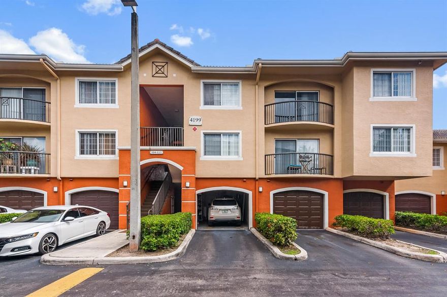 3 bedroom, 2 bathroom with 1 car garage in Grand Isles. This first floor unit features impact windows and doors, wood flooring throughout, split bedroom floor plan, large living room, and washer and dryer in the unit. Community features resort style amenities and security gate.