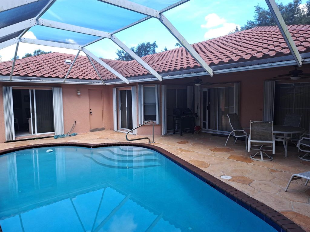 Photo of 4104 NW 59th Street, Coconut Creek, FL 33073 (MLS # R11135857)