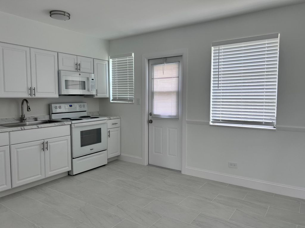 Photo of 630 Prosperity Farms Road #2, North Palm Beach, FL 33408 (MLS # B26026000)