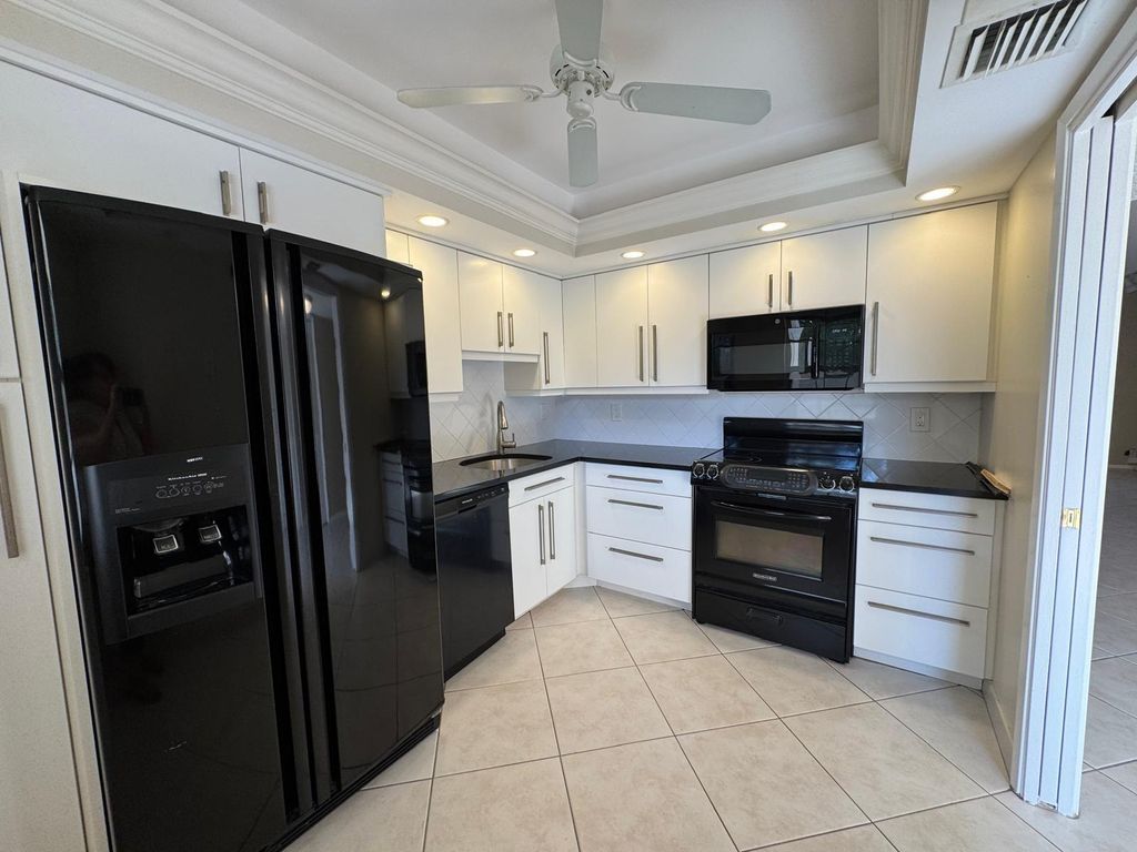 Photo of 3507 Oaks Way #208, Pompano Beach, FL 33069 (MLS # F10514320)