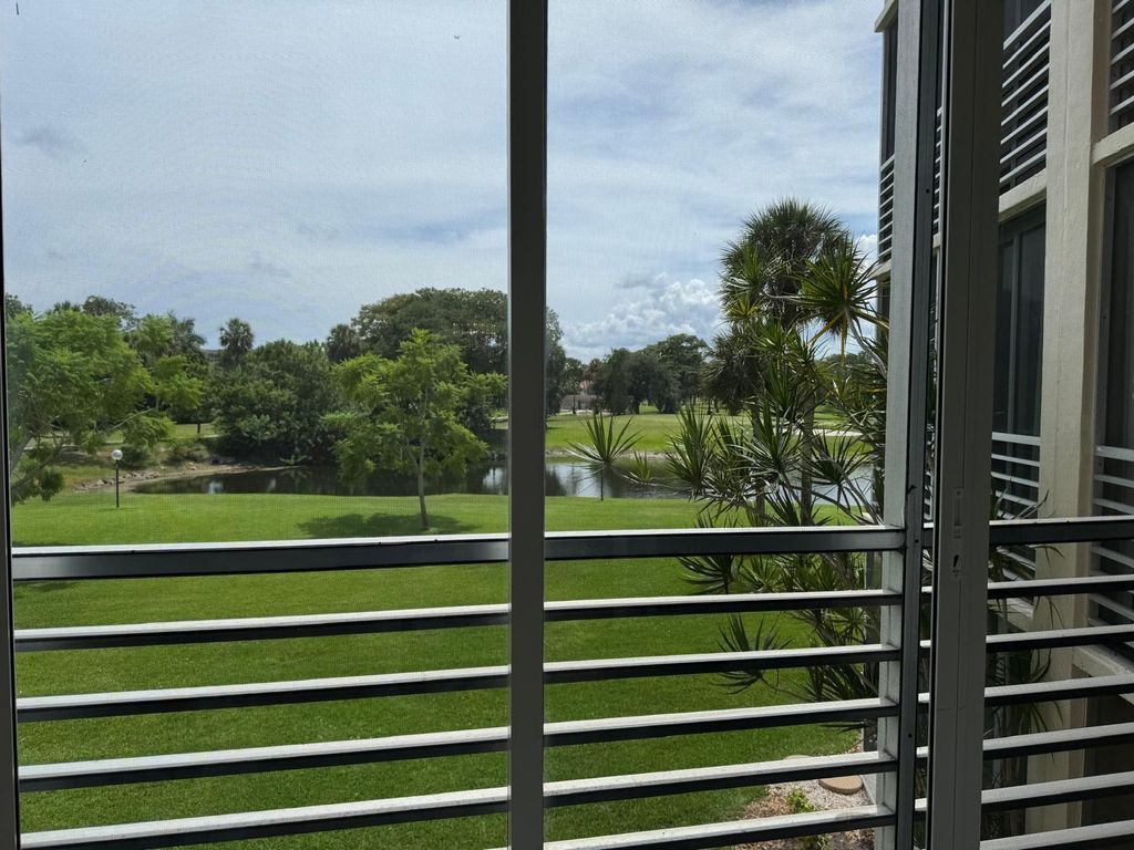 Photo of 3507 Oaks Way #208, Pompano Beach, FL 33069 (MLS # F10514320)