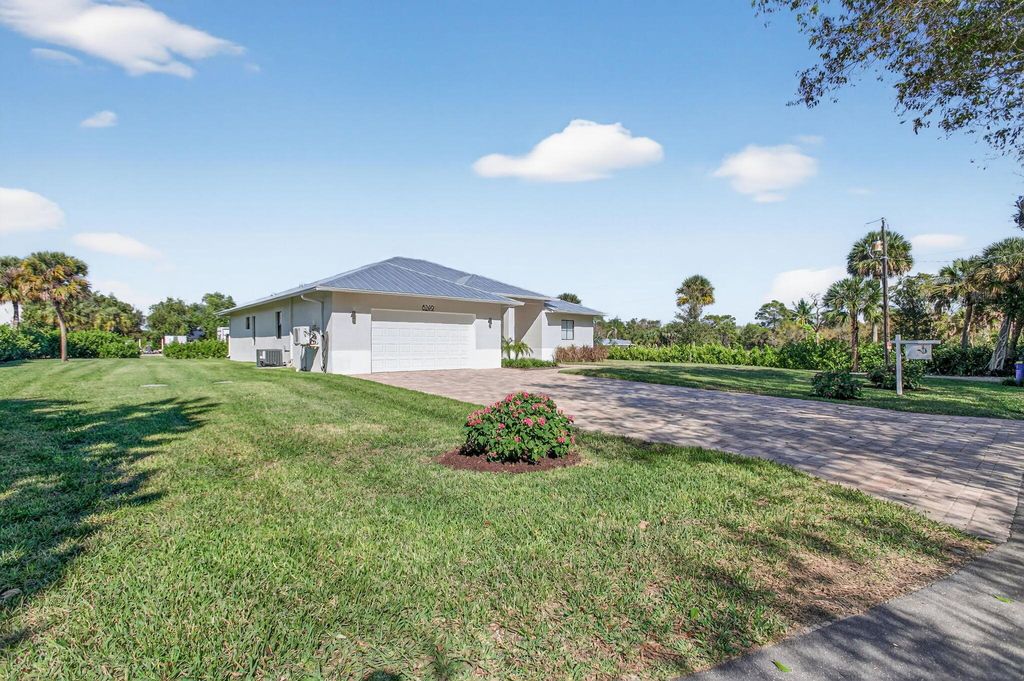 Photo of 8249 SE Dharlys Street, Hobe Sound, FL 33455 (MLS # R11145830)