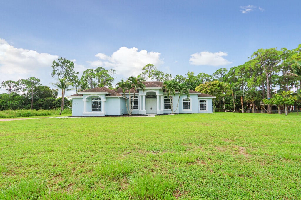 Photo of 14772 ORANGE Boulevard, The Acreage, FL 33470 (MLS # B26074550)