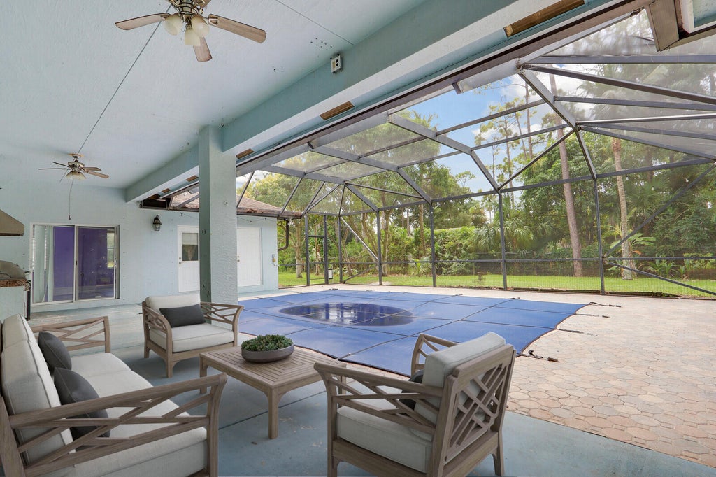 Photo of 14772 ORANGE Boulevard, The Acreage, FL 33470 (MLS # B26074550)