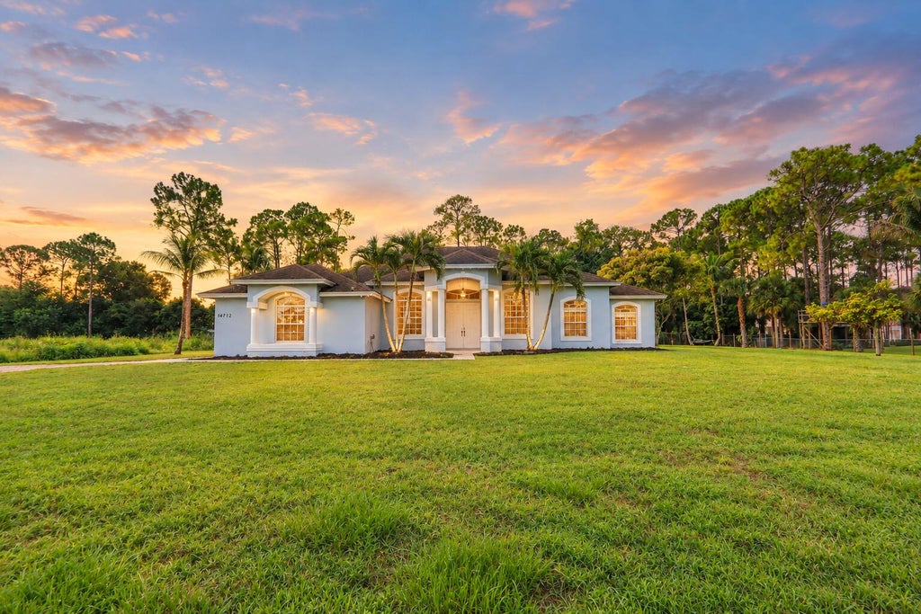 Photo of 14772 ORANGE Boulevard, The Acreage, FL 33470 (MLS # B26074550)