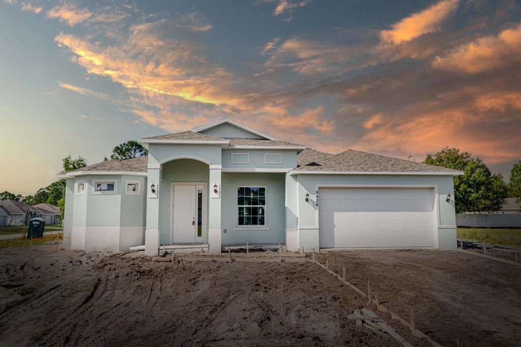 Photo of 5926 NW Carefree Street, Port Saint Lucie, FL 34986 (MLS # R10774047)