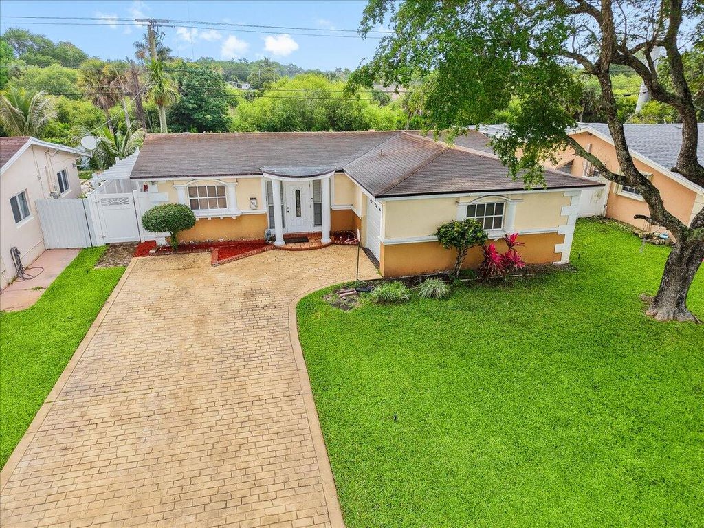 Photo of 3509 Garden Lane, Miramar, FL 33023 (MLS # B26015973)