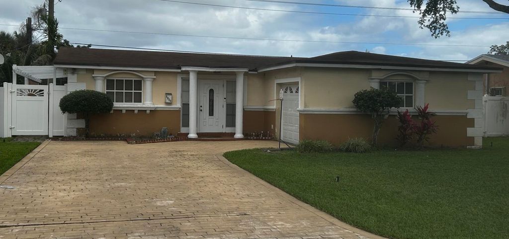 Photo of 3509 Garden Lane, Miramar, FL 33023 (MLS # B26015973)