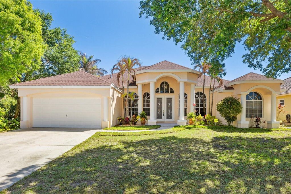 Photo of 1717 SW Erie Street, Port Saint Lucie, FL 34953 (MLS # B26006227)