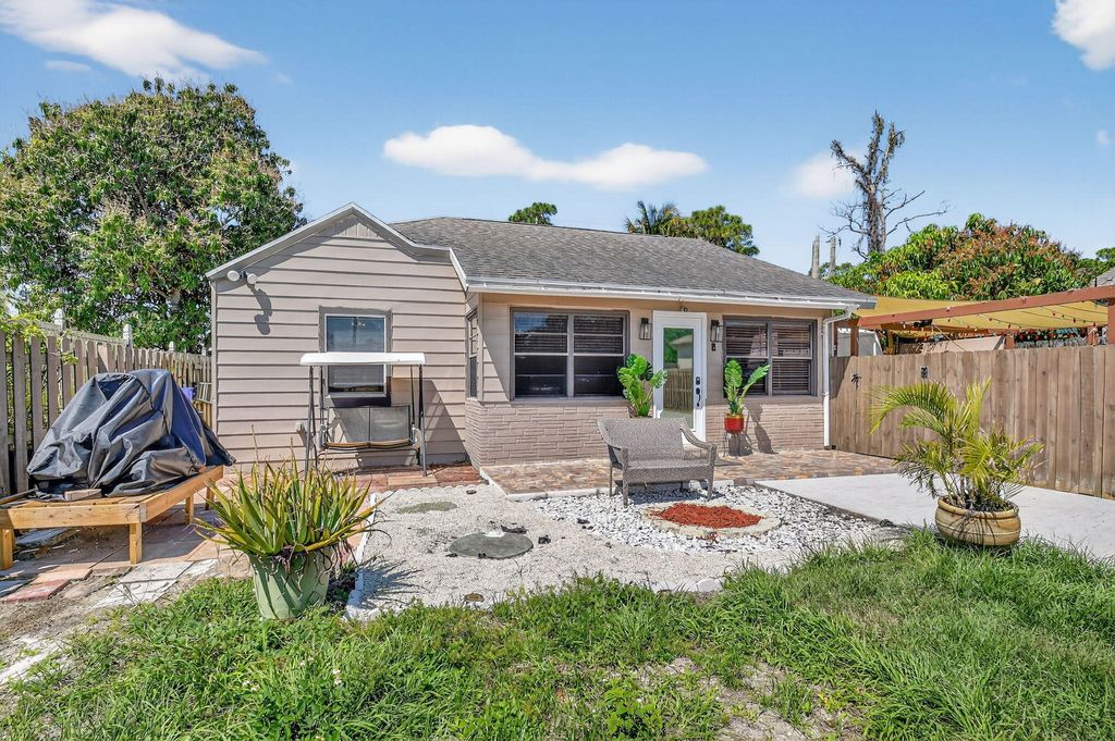 Photo of 425 Broward Avenue, Greenacres, FL 33463 (MLS # B26006154)