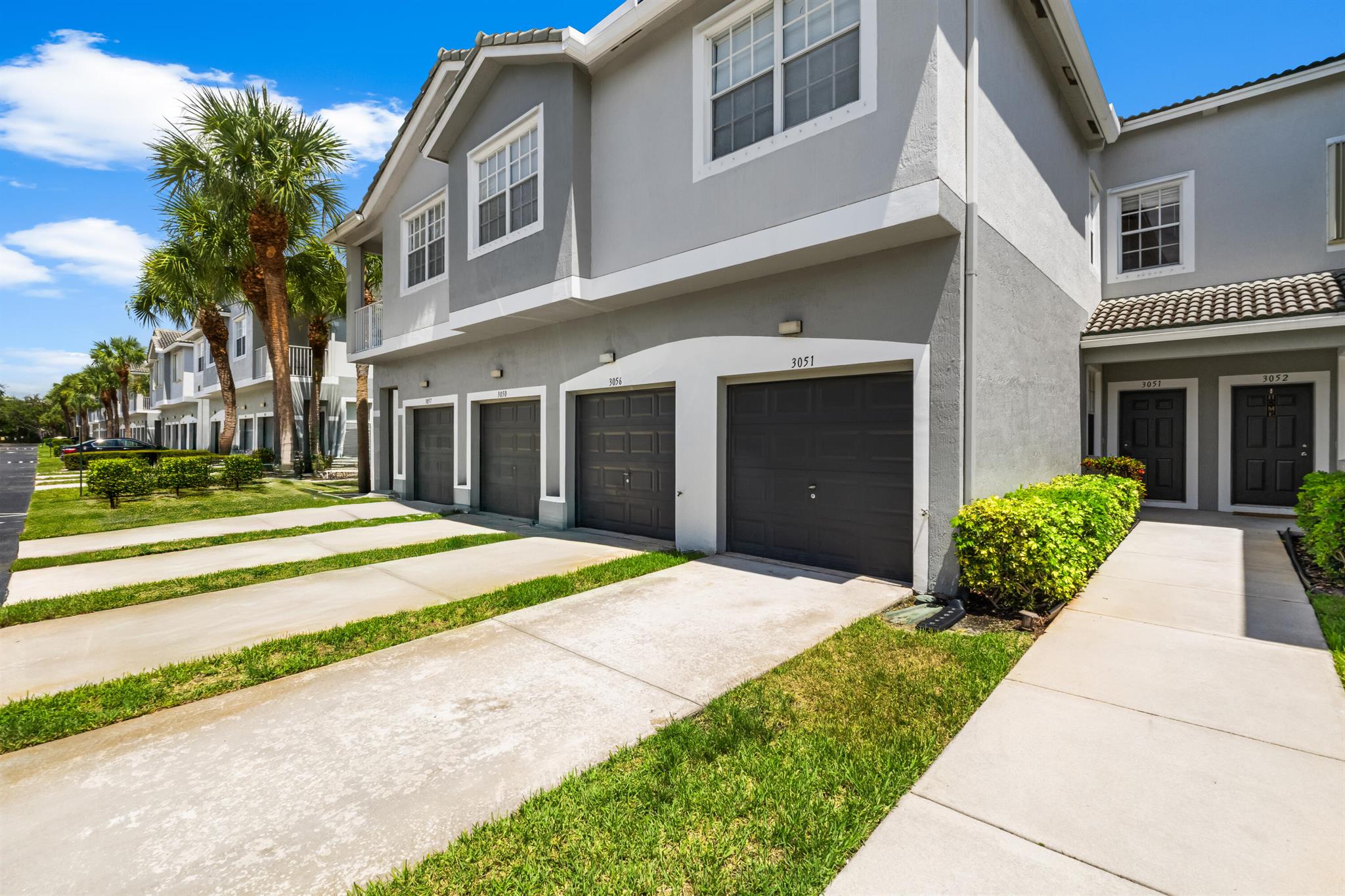 Beautifully maintained 3BR/2.5BA townhouse with attached garage and private driveway located in one of Greenacres' most sought-after communities! Features a new A/C system, spacious layout, and a fenced backyard--great for entertaining or pets. Pet-friendly, very well-kept, and move-in ready. HOA includes water, roof maintenance, and building insurance for peace of mind. Easy to show and perfect as a primary home or investment. Don't miss this opportunity at 3051 Grandiflora Dr, Greenacres!