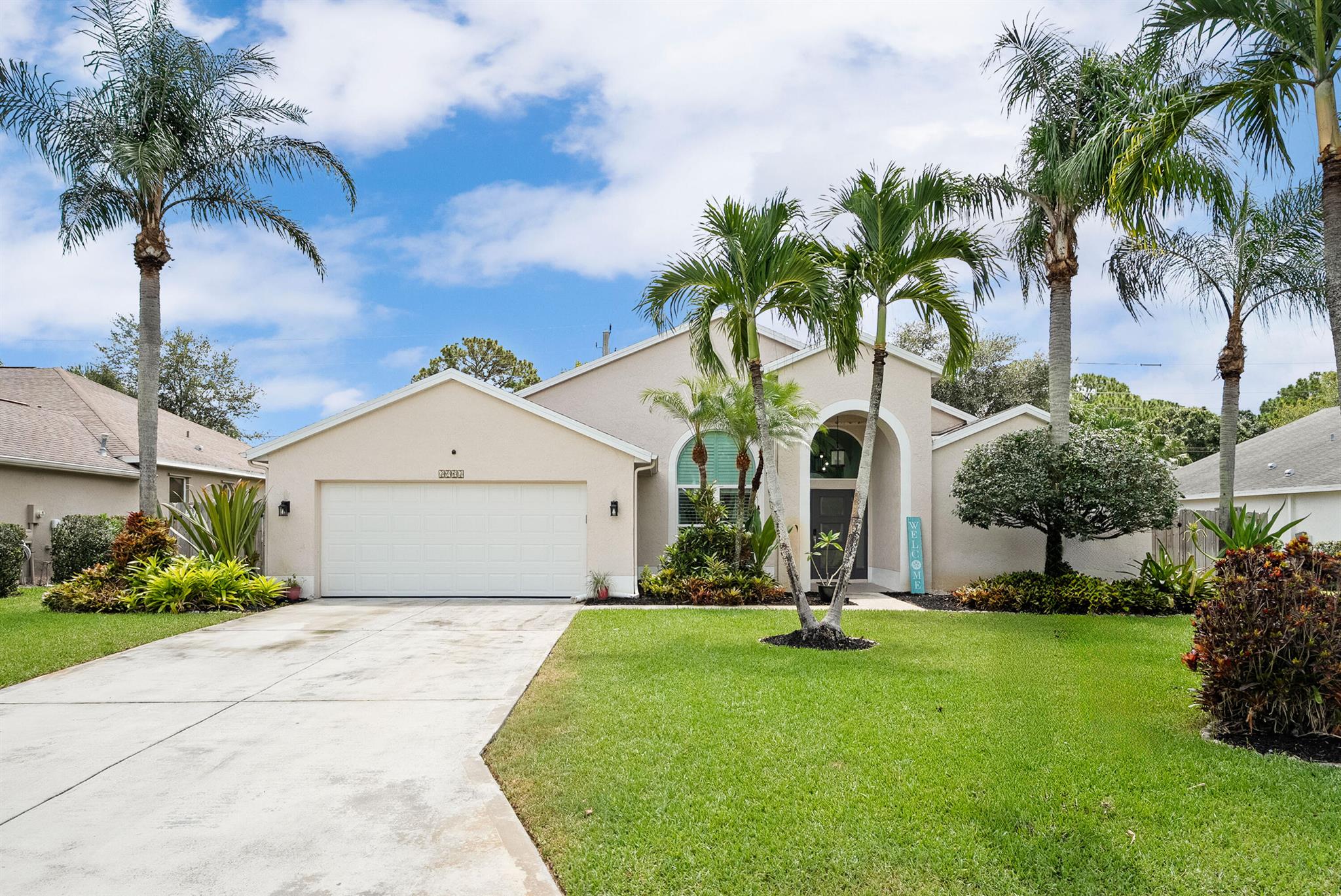 Love where you live--inside and out. Welcome to a beautifully renovated 3BR, 2BA pool home in Palm City's Islesworth. Enjoy peace of mind with impact windows, sliders, and doors, new insulated garage door and opener, and an epoxied garage floor. The pool has a new heater and smart light, plus a fenced backyard. Inside features include a remodeled guest bath, vinyl flooring, smart lighting, fans, and WiFi sprinkler control. Zoned A+ schools, low HOA!