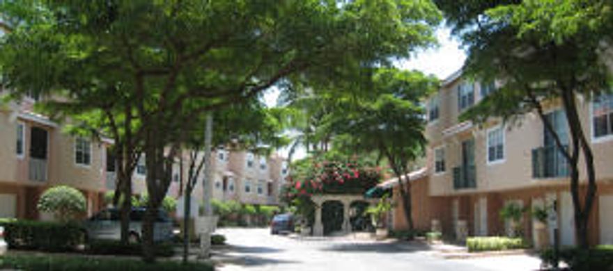 3 bed / 3 bath / 2 car garage townhouse-style apartment for lease.  Garage and main entry on ground floor, kitchen, living room and one bedroom on 2nd floor, other 2 bedrooms (including master) on 3rd floor.  Large balcony on 2nd floor.  Renovated unit with granite and wood in the kitchen and baths.  Located directly across from Town Center Mall, close to I-95 and the Turnpike.