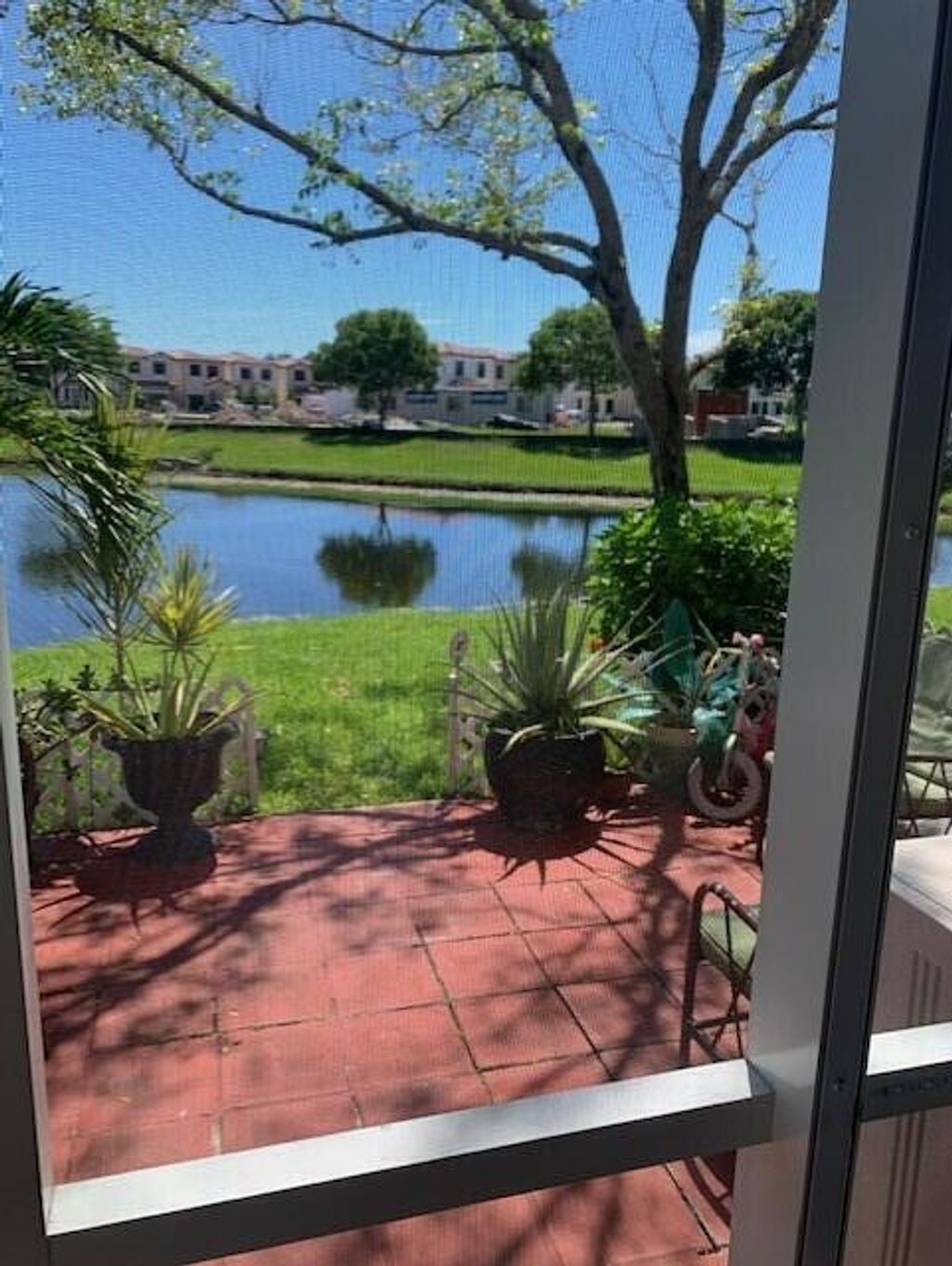 Photo of 4149 Napoli Lake Drive, Riviera Beach, FL 33410 (MLS # R10798991)