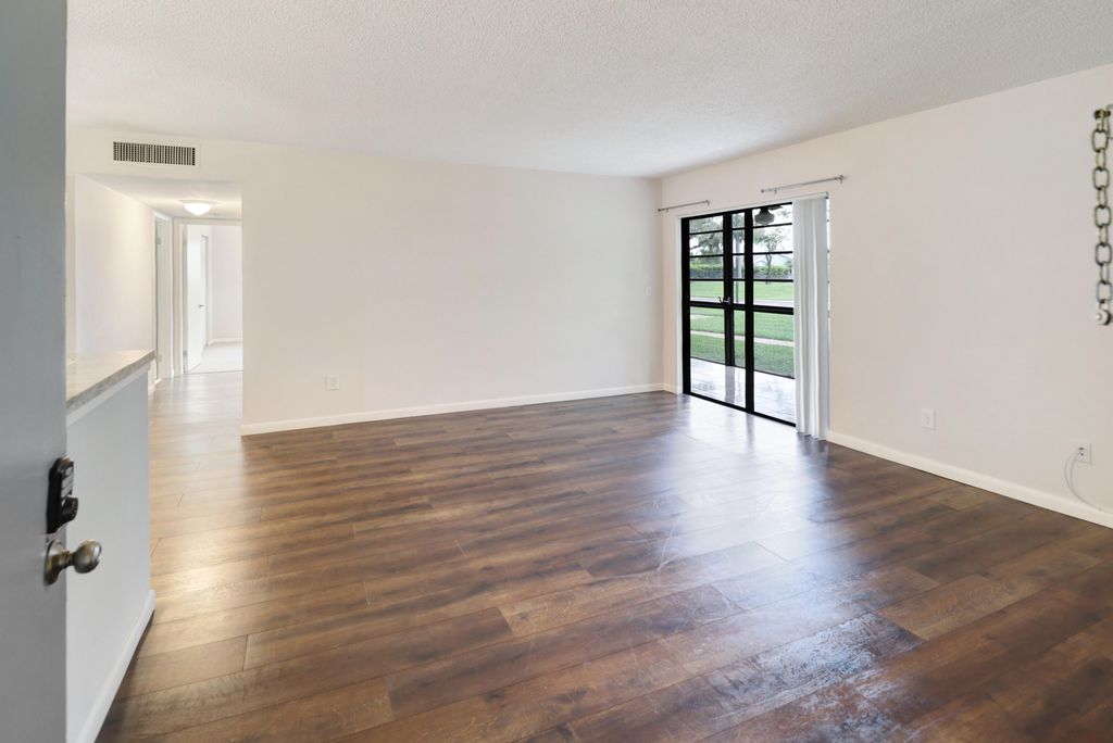 Photo of 7801 Ashmont Circle #104, Tamarac, FL 33321 (MLS # B26034507)