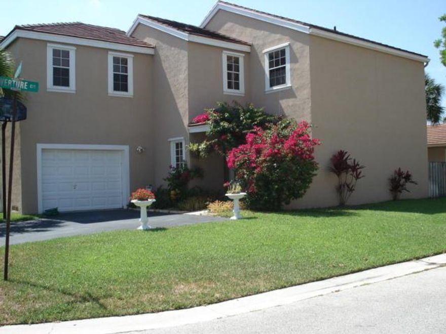 TRUE 5 BEDROOM, 2 STORY HOME WITH LARGE FENCED BACK YARD. ALL BEDROOMS ARE UPSTAIRS. UPGRADED KITCHEN & BATHROOMS.  ALL TILE DOWNSTAIRS, CARPETING UP. INSIDE WASHER/DRYER. GATED COMMUNITY. BEAUTIFUL COMMUNITY POOL ON THE LAKE AND A TOT LOT FOR THE LITTLE ONES. GREAT SCHOOLS, CLOSE TO ALL SHOPPING, PARKS & CONVENIENT TO EVERYTHING.