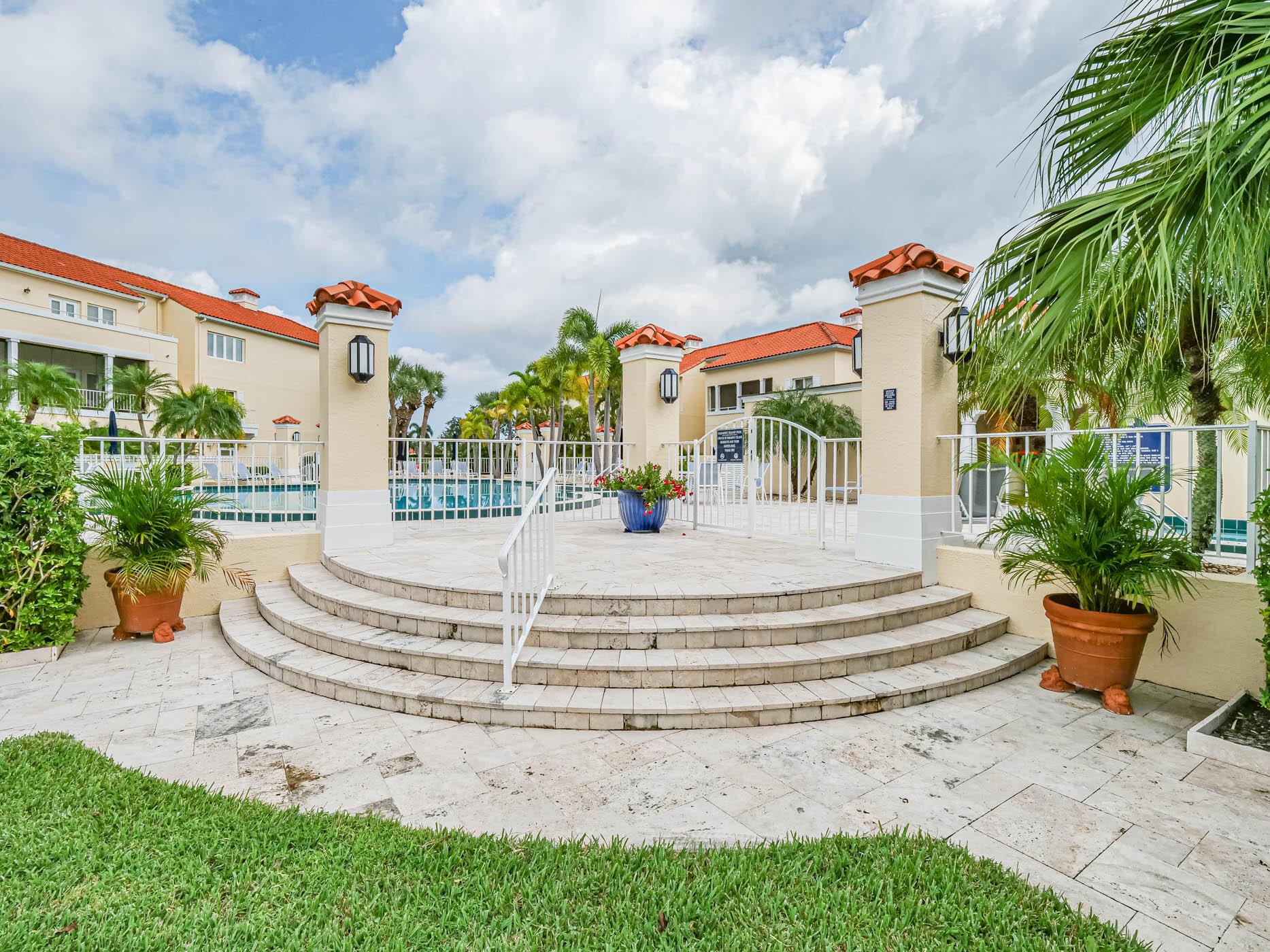 All is Grand at the elegant Grand Harbor community! Fully furnished lovely unit including inside washer/dryer. Watch spectacular sunsets from your screened and covered balcony overlooking the 18th fairway in Harmony Circle. Newly recarpeted throughout and recently remodeled bathroom. WIFI and smart TVs included. This spacious one-bedroom unit also has a queen sleeper/sofa and recliners in living room, making it very cozy for guests. Enjoy the 'resort-like' amenities including pool and clubhouse. This lovely condo must be seen to be appreciated. Covered parking and storage unit as well.
