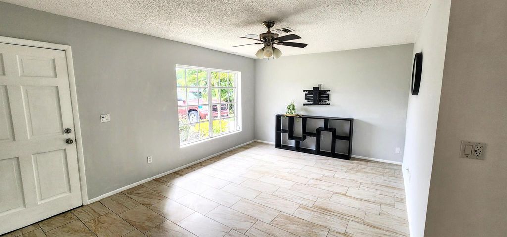 Photo of 365 SE Galleon Lane, Port Saint Lucie, FL 34983 (MLS # R11003443)