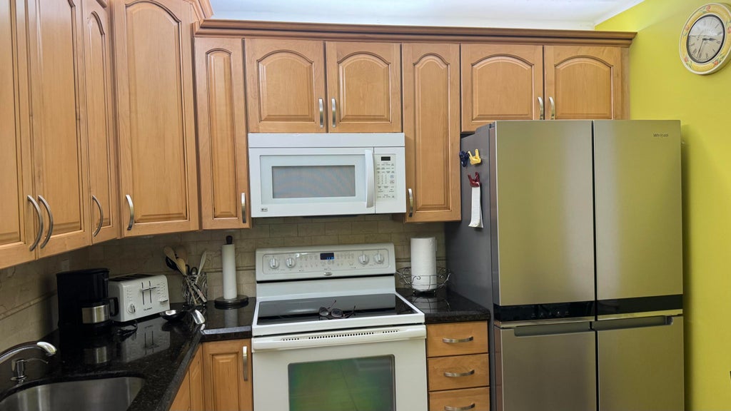 Photo of 2841 SOMERSET Drive #112, Lauderdale Lakes, FL 33311 (MLS # B26092355)