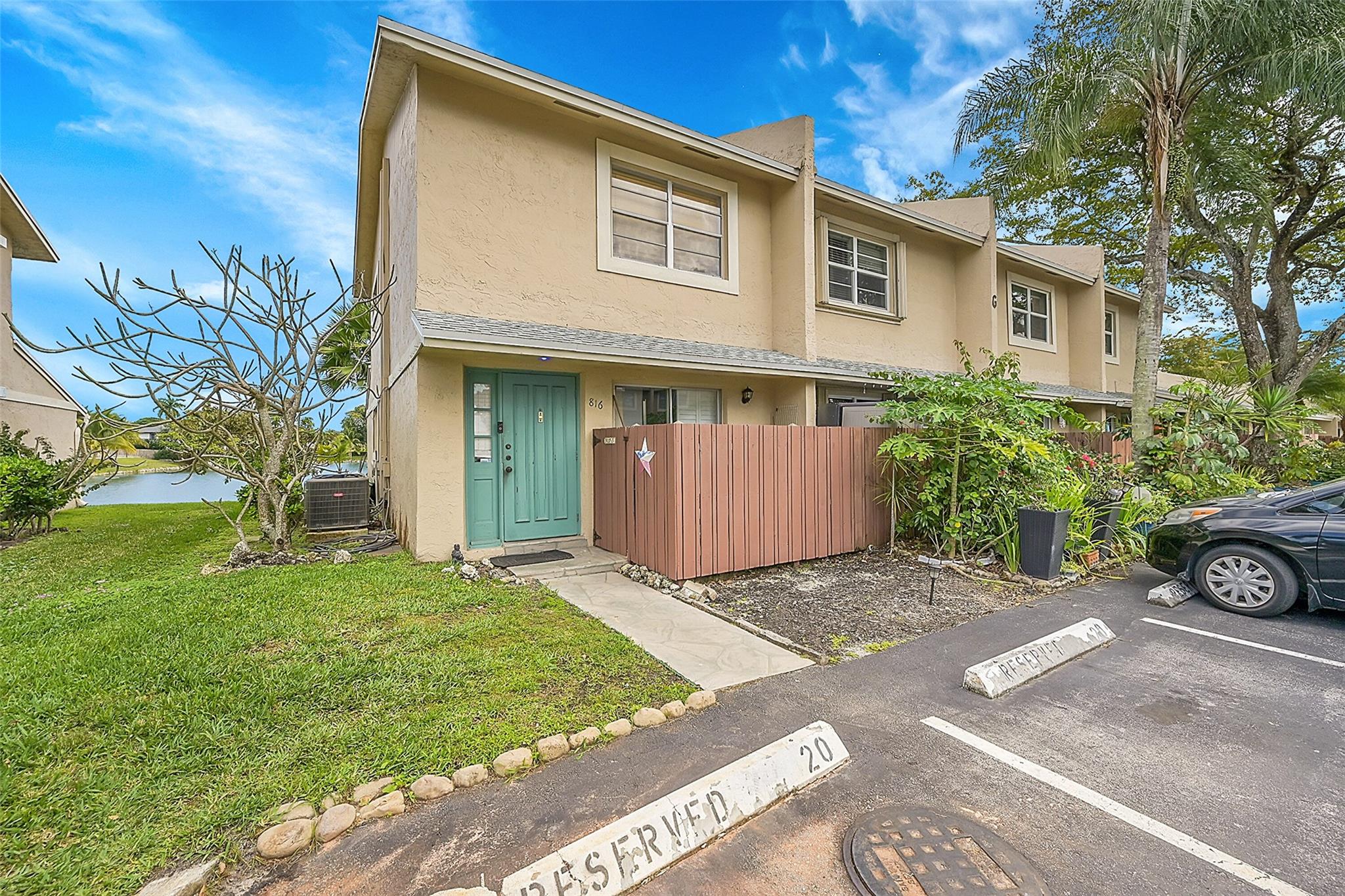 Make this amazing waterfront townhouse in Coconut Creek your home. This 2-bed, 1.5 bath home boasts 1,224 sq ft of light filled, open living spaces designed for comfort and style. The kitchen with essential appliances plus in-house washer and dryer flows seamlessly into the dining area, perfect for daily living and entertainment. It has an amazing backyard and the association covers the roof, wall painting and amenities. No assessment!!!! It has reserves!!!!!
Step outside to a serene backyard with breathtaking lake views ideal for sunsets and gatherings. Enjoy community perks like roof maintenance, a pool and a club house. Conveniently located near shopping, dining, and parks. This home offers a peaceful lakeside lifestyle. Schedule a tour today and make it yours.