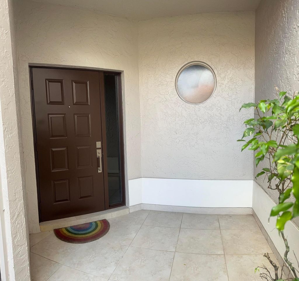 Photo of 10458 Lake Vista Circle, Boca Raton, FL 33498 (MLS # B26004552)