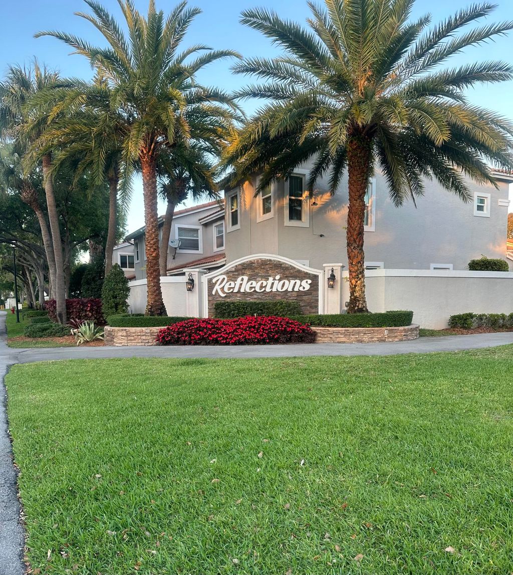 Photo of 10458 Lake Vista Circle, Boca Raton, FL 33498 (MLS # B26004552)
