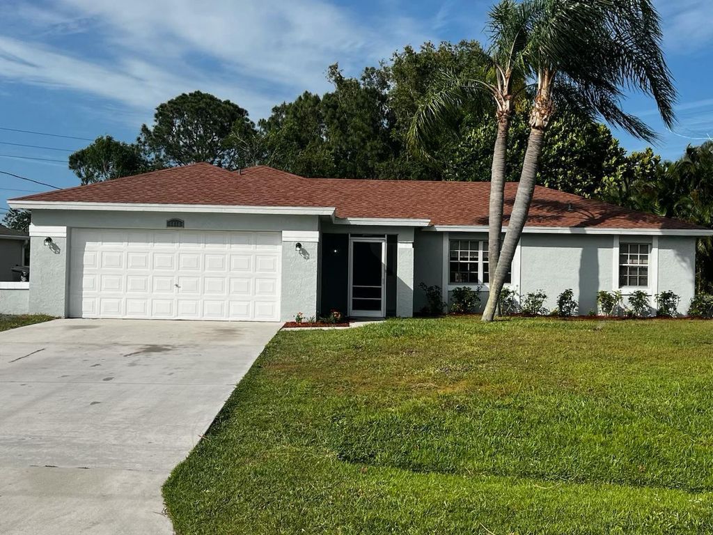 Photo of 4444 NW Hegar Place, Port Saint Lucie, FL 34983 (MLS # R10975430)