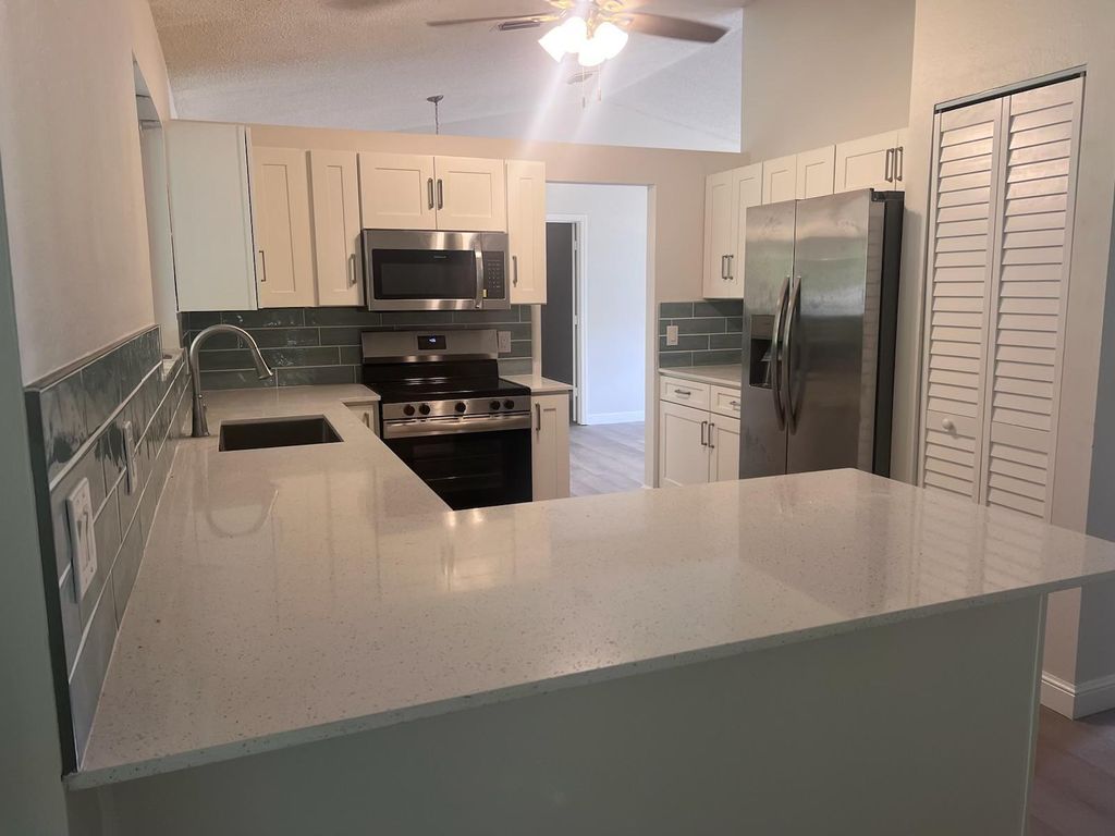 Photo of 4444 NW Hegar Place, Port Saint Lucie, FL 34983 (MLS # R10975430)