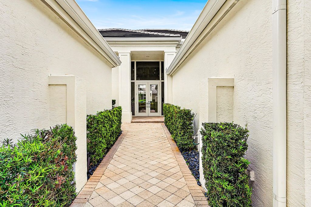 Photo of 1128 Crystal Drive, Palm Beach Gardens, FL 33418 (MLS # B26017687)