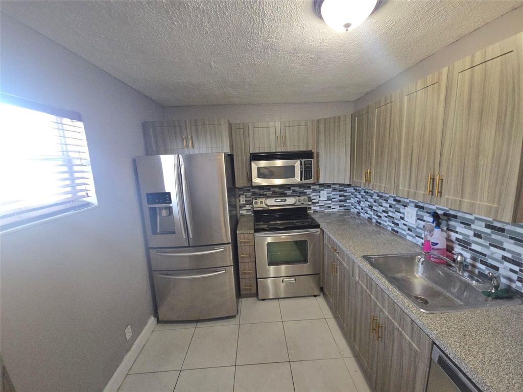 Photo of 7541 NW 16th Street #1408, Plantation, FL 33313 (MLS # F10484897)