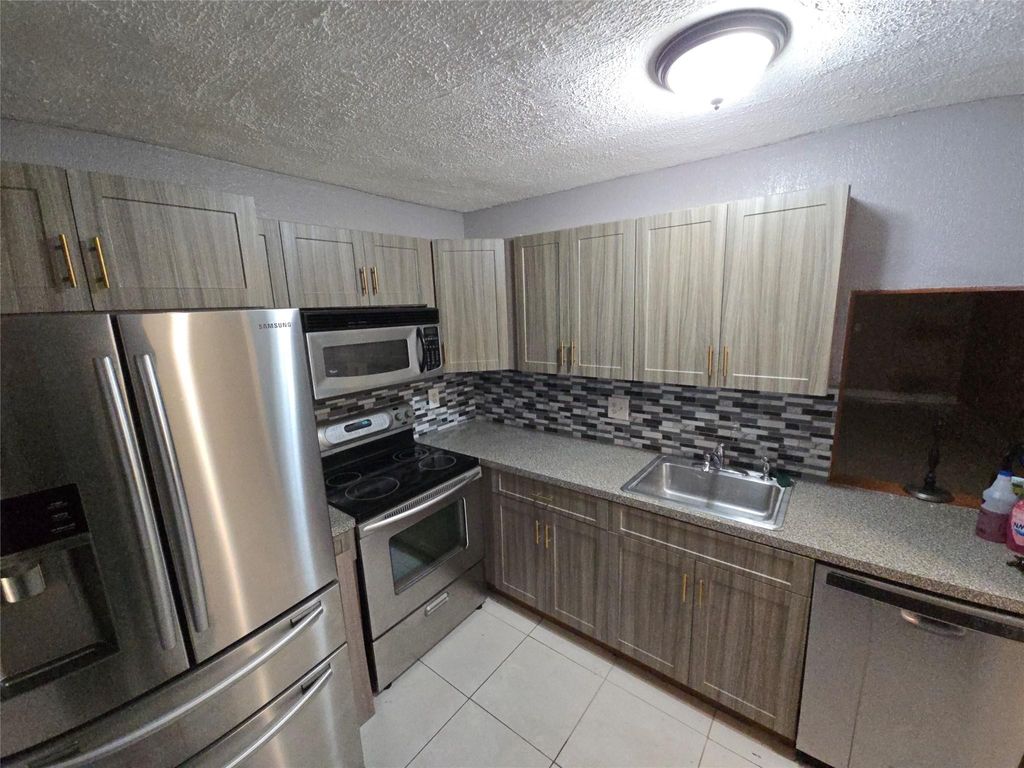 Photo of 7541 NW 16th Street #1408, Plantation, FL 33313 (MLS # F10484897)