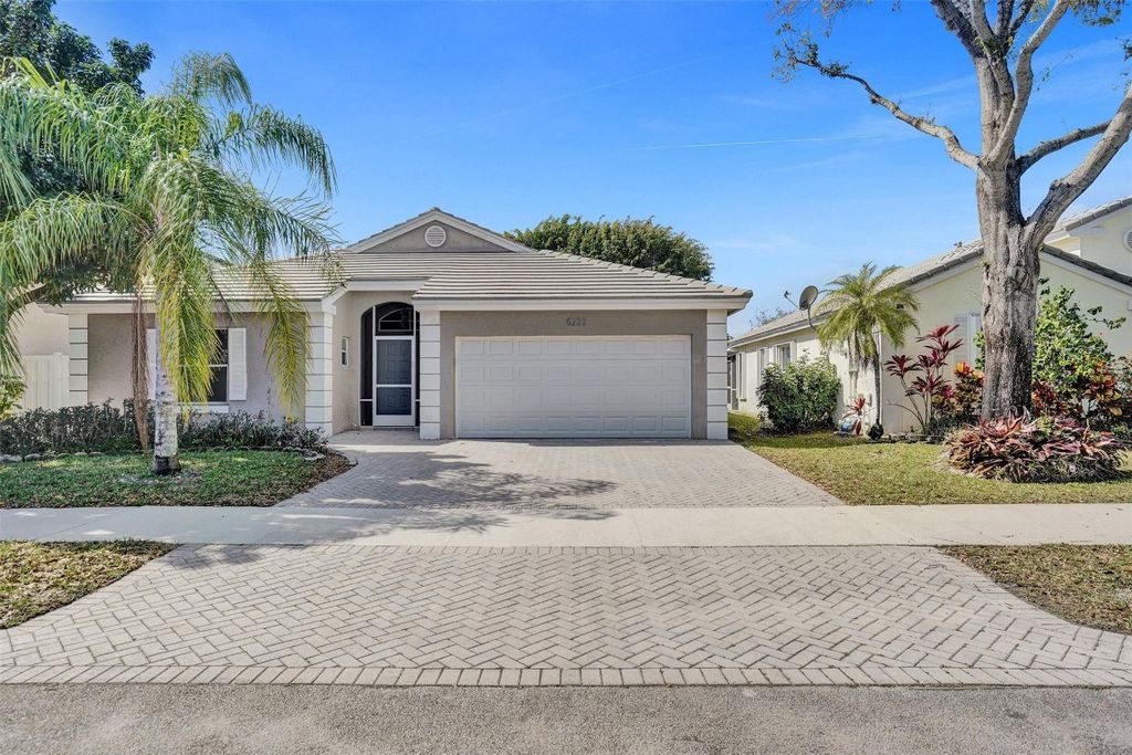 Photo of 5223 NW 54th Avenue, Coconut Creek, FL 33073 (MLS # F10486091)