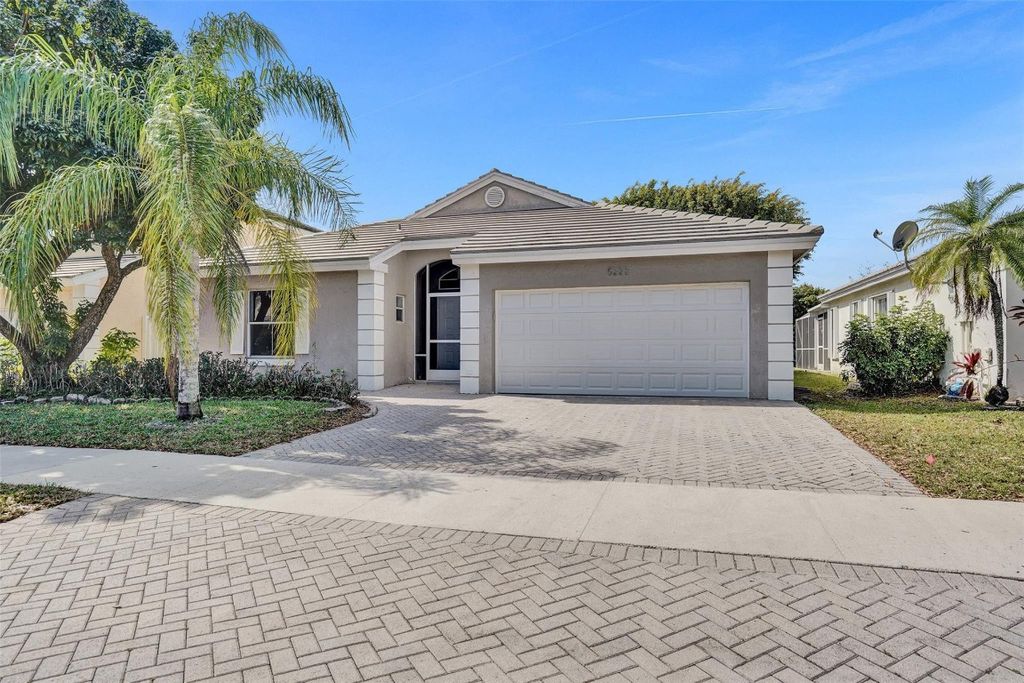 Photo of 5223 NW 54th Avenue, Coconut Creek, FL 33073 (MLS # F10486091)