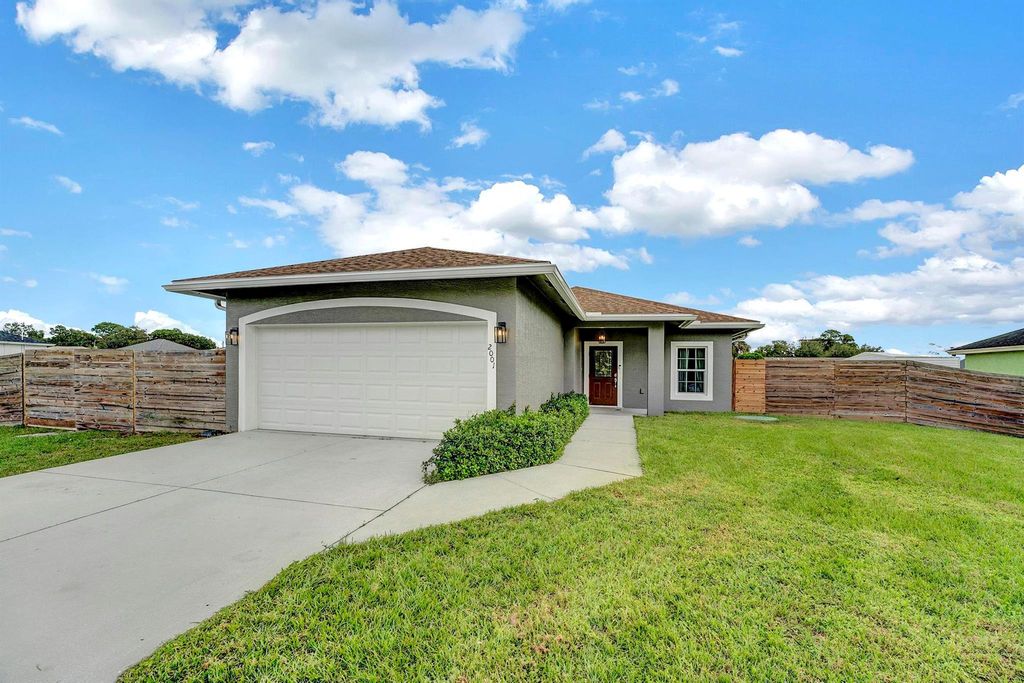 Photo of 2001 Sw Aguero St, Port Saint Lucie, FL 34953 (MLS # R11030219)