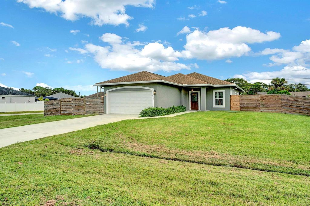 Photo of 2001 Sw Aguero St, Port Saint Lucie, FL 34953 (MLS # R11030219)