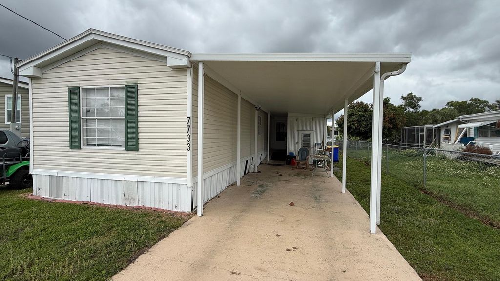 Photo of 7733 SE Fork River Drive, Stuart, FL 34997 (MLS # B26016402)
