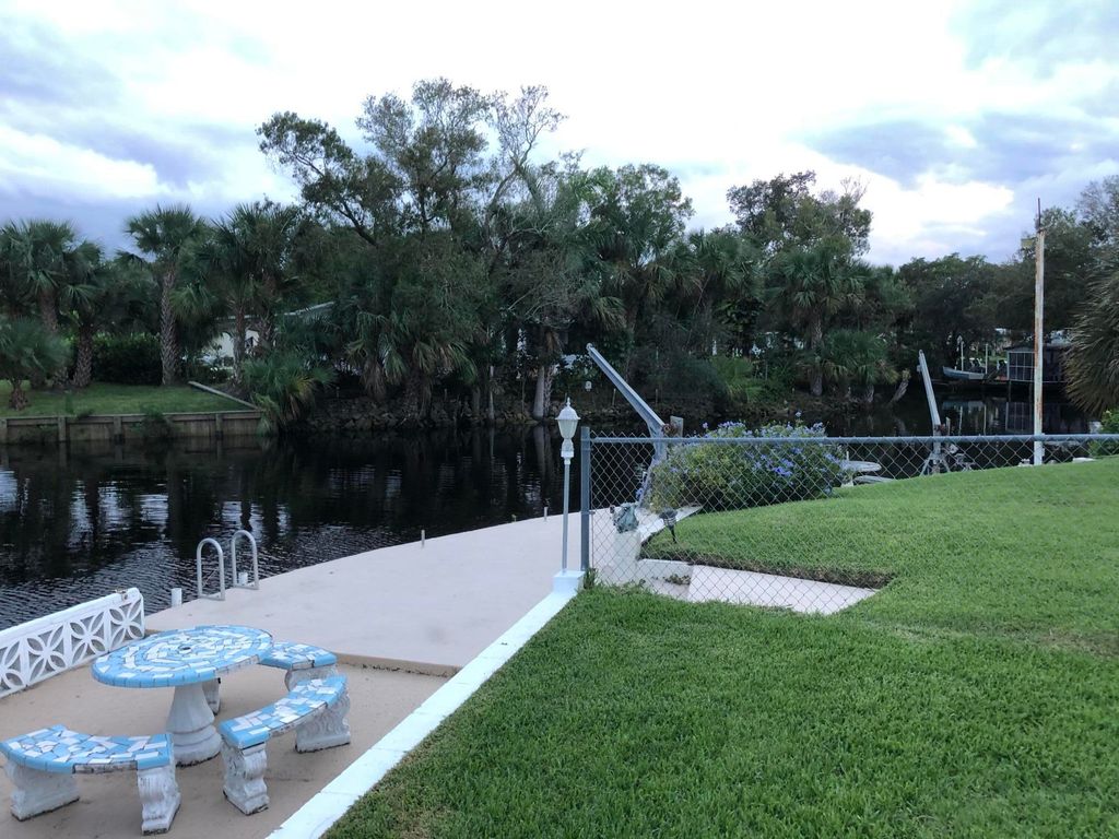 Photo of 7733 SE Fork River Drive, Stuart, FL 34997 (MLS # B26016402)