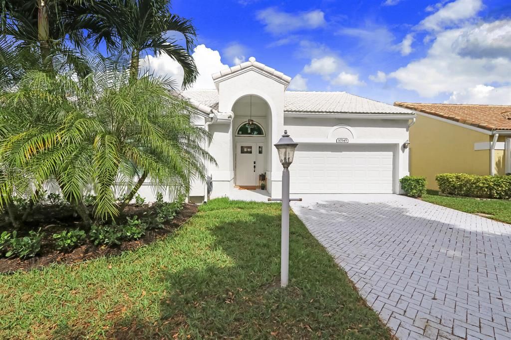 Photo of 10145 Aspen Way, Palm Beach Gardens, FL 33410 (MLS # R10693789)