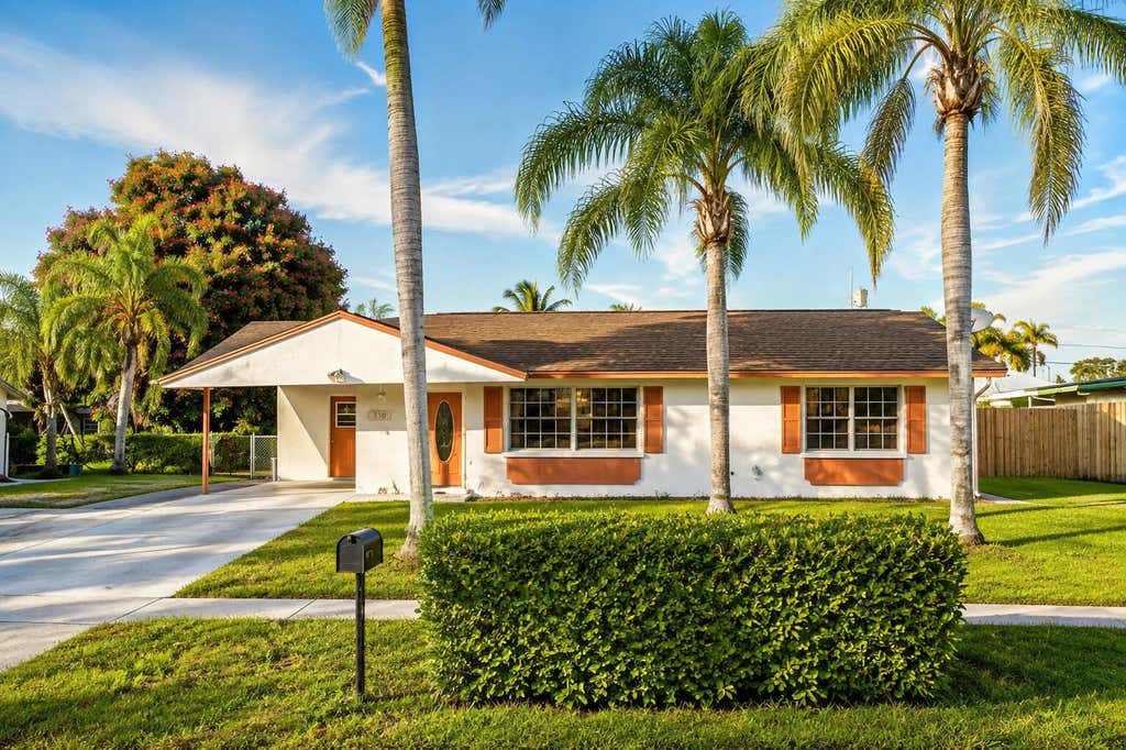 Photo of 330 W 22ND Court, Riviera Beach, FL 33404 (MLS # B26067288)