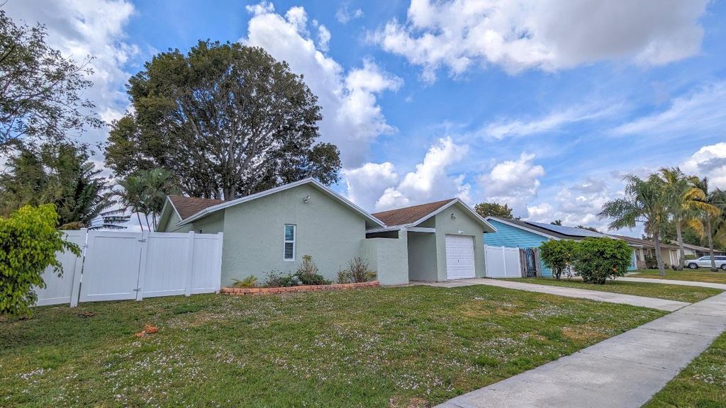 Photo of 1103 Harmony Way, Royal Palm Beach, FL 33411 (MLS # R11127899)