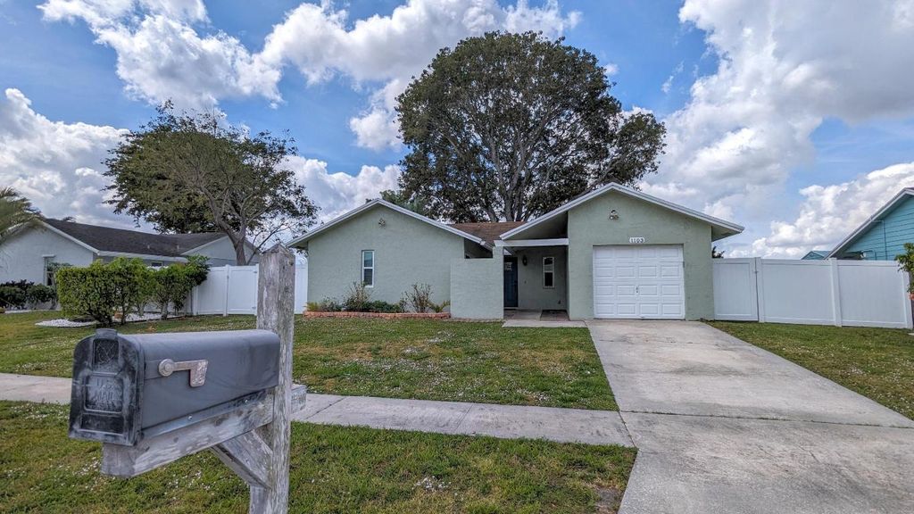 Photo of 1103 Harmony Way, Royal Palm Beach, FL 33411 (MLS # R11127899)